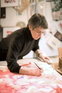 Sara Steele in her studio painting